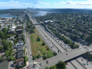 An aerial view of Interstate 5 between the University District and Wallingford, looking south towards Downtown