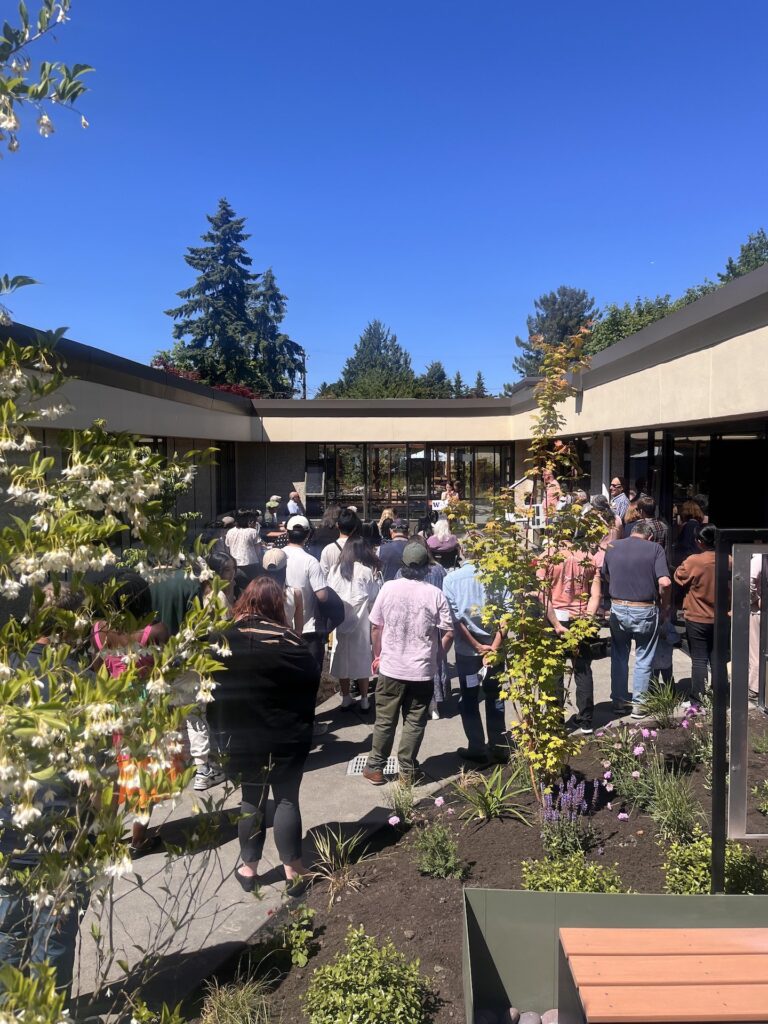 group gathered to hear speeches about the new garden