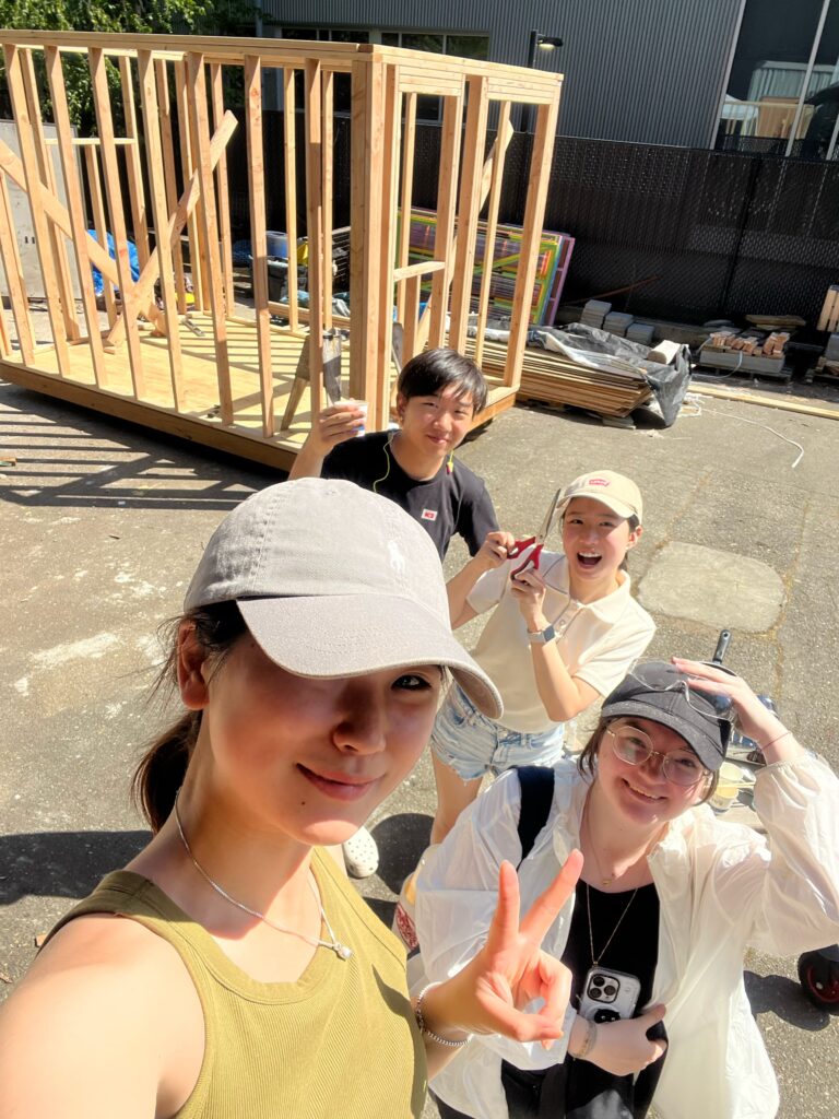 selfie of students who worked on tiny house